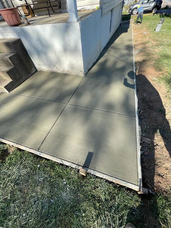 Freshly finished concrete driveway pad